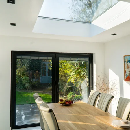 Extension with a flat glass rooflight